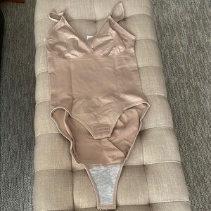 Sleek Beige Bodysuit